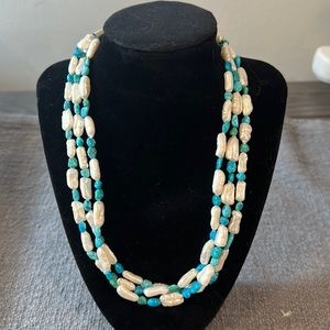 20” adjustable blue and white beaded necklace